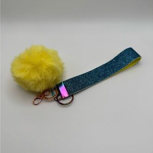 Blue Glitter and Yellow Wristlet Keychain with Fluffy Yellow Pom Pom